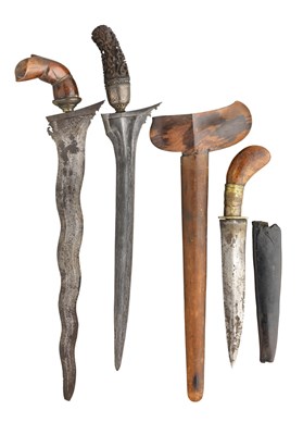 Lot 106 - **THREE SOUTH-EAST ASIAN DAGGERS